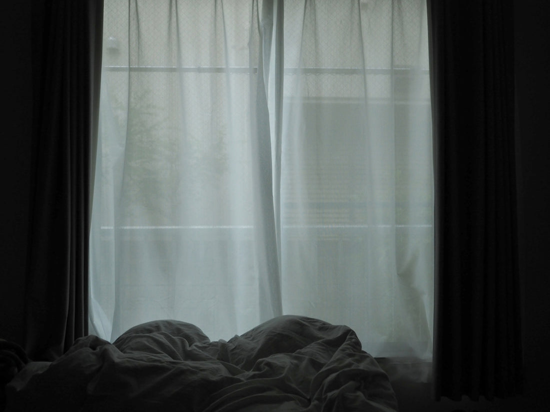 a bed with a window