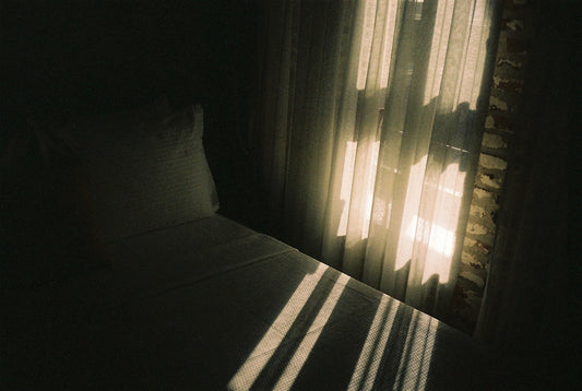 a light shining through a window